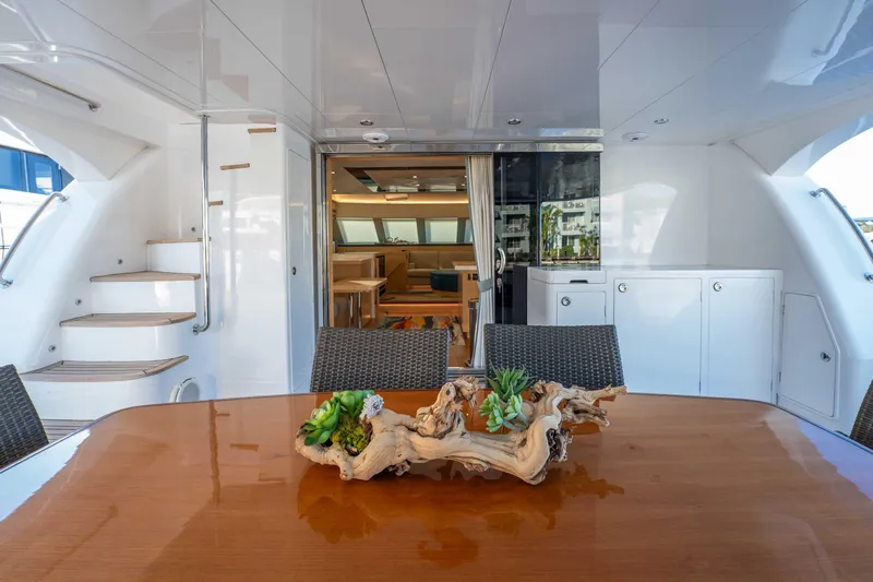 Sea Dreamz Yacht Photos Pics Luxurious Horizon PC52 yacht interior with elegant dining area and modern decor, 2016 model.