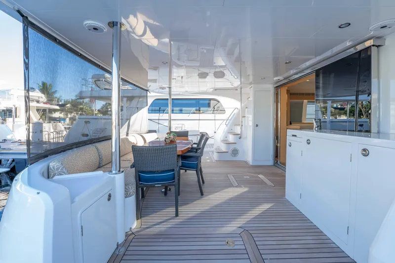 Sea Dreamz Yacht Photos Pics Luxurious 2016 Horizon PC52 yacht interior with elegant seating and dining area.