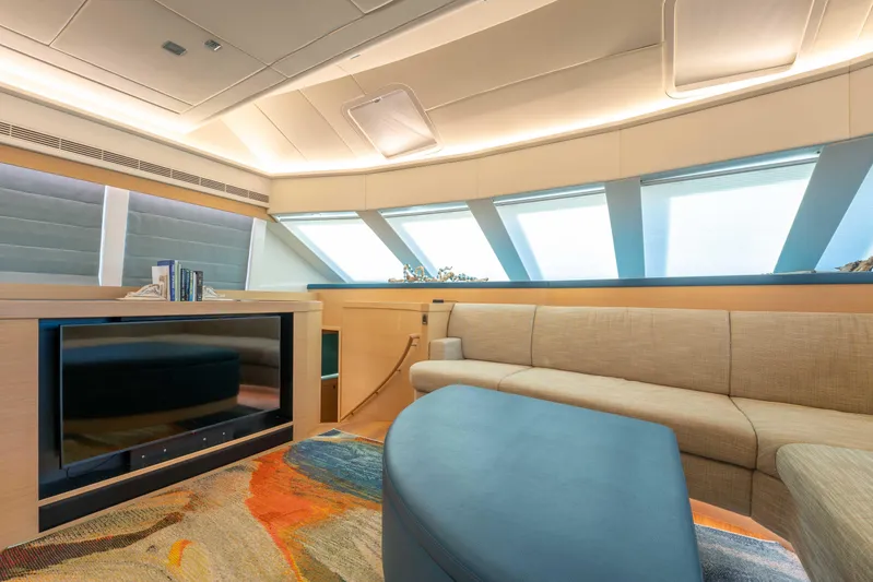 Sea Dreamz Yacht Photos Pics Luxurious interior of 2016 Horizon PC52 yacht with modern seating and large windows.