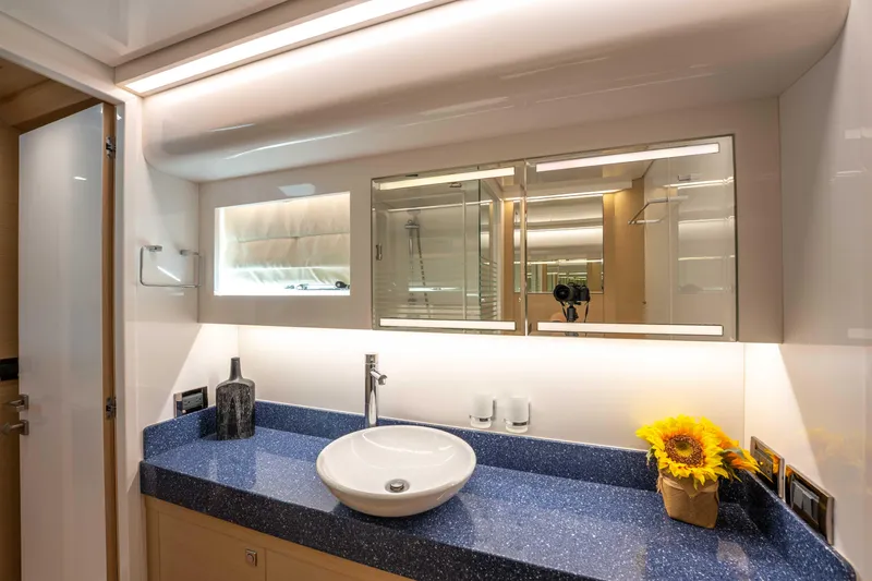 Sea Dreamz Yacht Photos Pics Luxurious bathroom in 2016 Horizon PC52 yacht with modern fixtures and elegant decor.