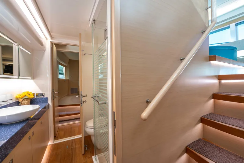 Sea Dreamz Yacht Photos Pics Luxurious bathroom and staircase in 2016 Horizon PC52 yacht interior.