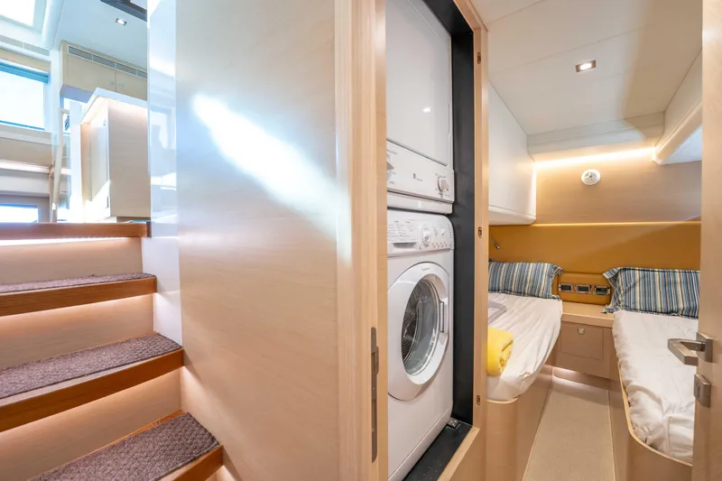 Sea Dreamz Yacht Photos Pics Interior of 2016 Horizon PC52 yacht with laundry and twin beds.