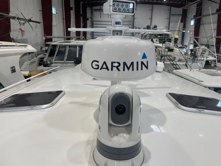 Artemis Yacht Photos Pics 2023 MJM 4 boat with Garmin radar system in a marina setting.