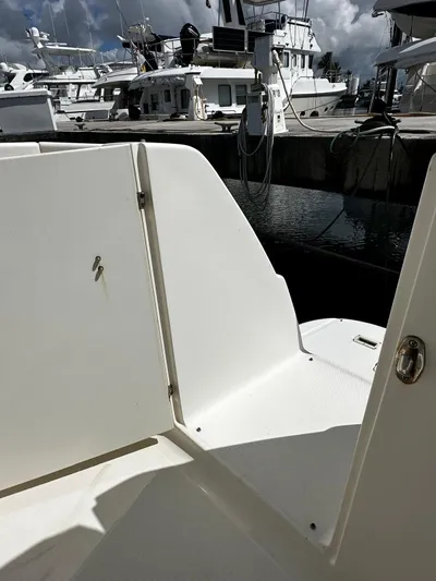  Yacht Photos Pics 2006 Silverton 43 Sport Bridge yacht docked at marina, featuring open deck area.