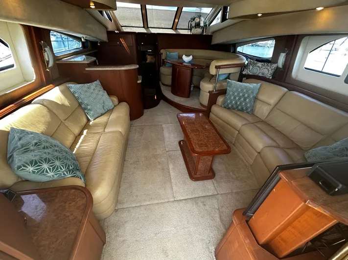  Yacht Photos Pics Luxurious interior of a 2006 Silverton 43 Sport Bridge yacht with leather seating.