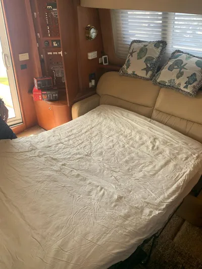  Yacht Photos Pics Interior of 2006 Silverton 43 Sport Bridge with convertible sofa bed.