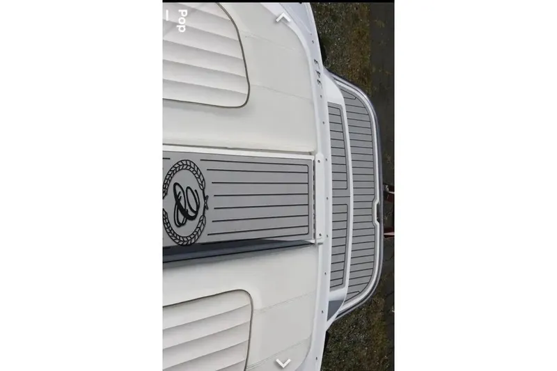  Yacht Photos Pics Top view of a 2007 Cobalt 343 boat deck with logo and sleek design.