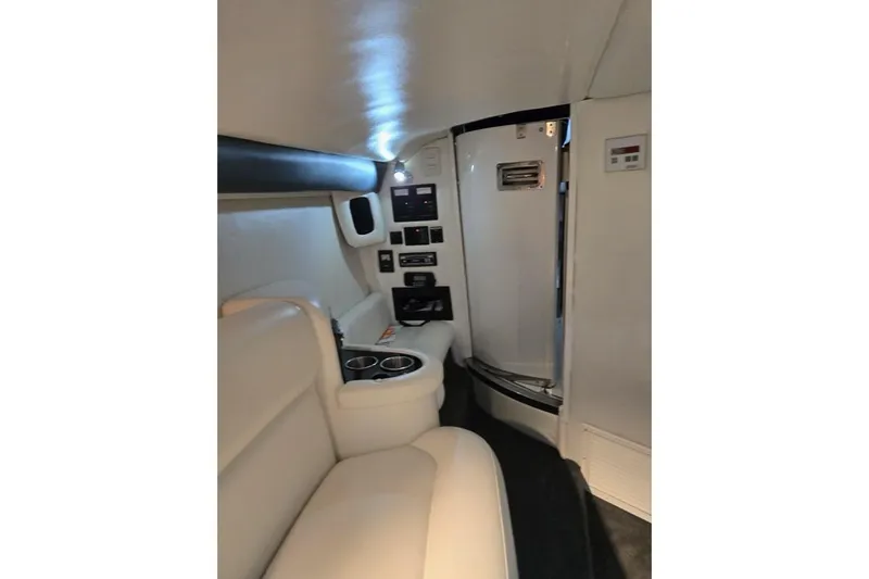  Yacht Photos Pics Luxurious interior of a 2007 Cobalt 343 boat with white leather seating.