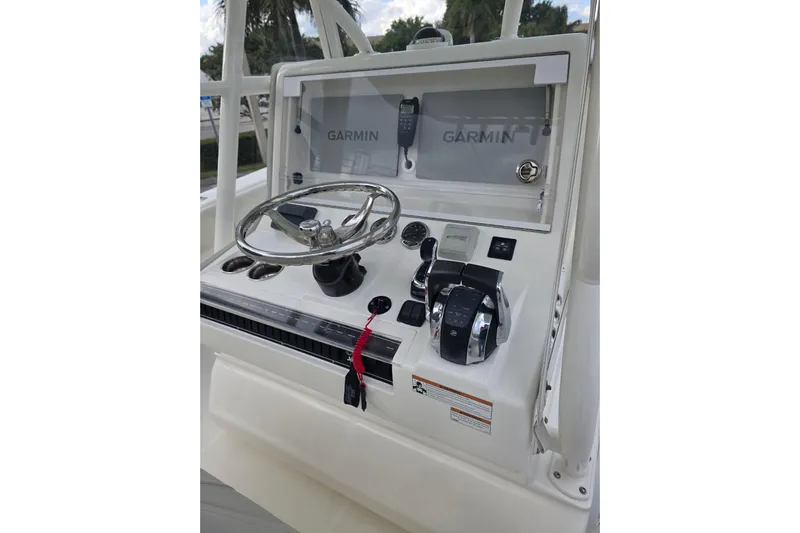 Seavee Yacht Photos Pics 2022 SeaVee 340Z boat console with Garmin navigation and steering wheel.