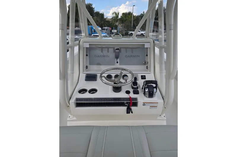 Seavee Yacht Photos Pics 2022 SeaVee 340Z boat console with Garmin navigation system and steering wheel.