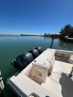  Yacht Photos Pics 2008 Grady-White Express 360 boat docked by serene waters under clear blue sky.