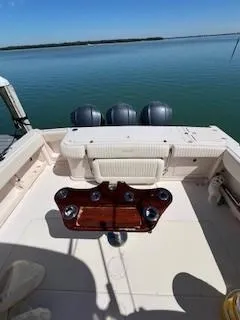  Yacht Photos Pics 2008 Grady-White Express 360 boat with triple engines on calm water.