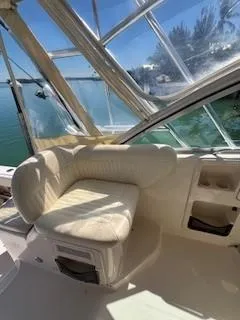  Yacht Photos Pics 2008 Grady-White Express 360 boat interior with cushioned seating and ocean view.