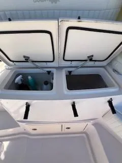  Yacht Photos Pics 2008 Grady-White Express 360 boat storage compartments with open lids.