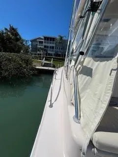  Yacht Photos Pics 2008 Grady-White Express 360 boat docked near waterfront property.