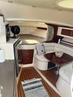  Yacht Photos Pics 2008 Grady-White Express 360 interior with seating, table, and kitchenette.