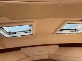  Yacht Photos Pics Interior cabin of 2008 Grady-White Express 360 with skylights and beige upholstery.