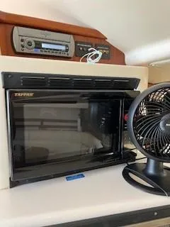  Yacht Photos Pics 2008 Grady-White Express 360 interior with microwave, fan, and stereo system.
