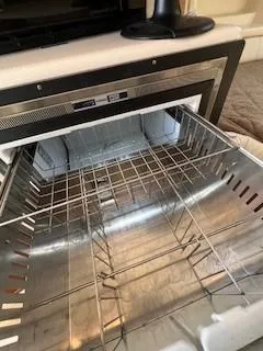  Yacht Photos Pics Open stainless steel oven inside a 2008 Grady-White Express 360 boat.