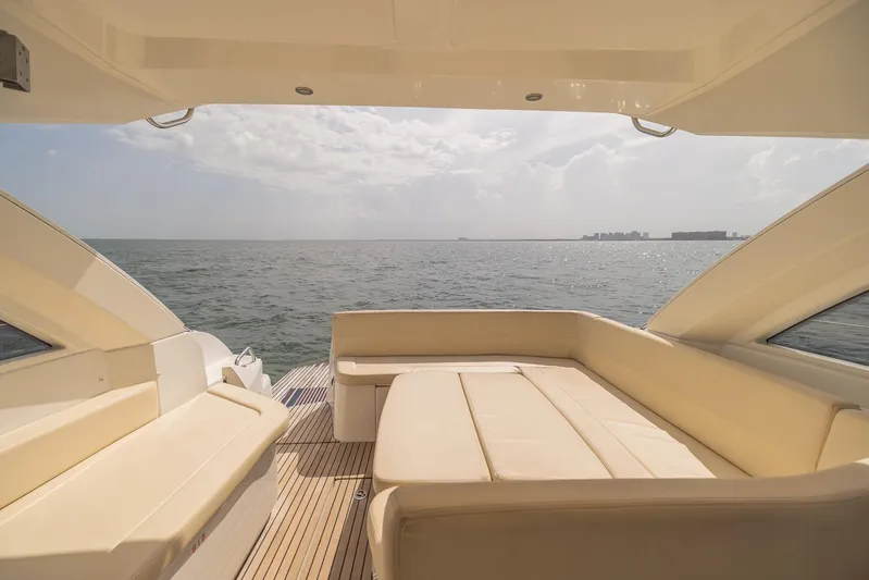 Ms Bordeaux Yacht Photos Pics Luxury seating area on 2013 Beneteau Gran Turismo 38 yacht, overlooking serene ocean view.