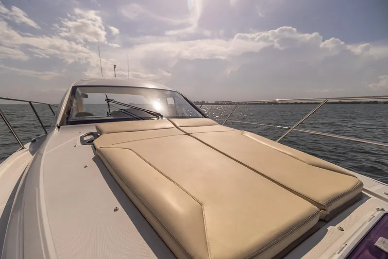 Ms Bordeaux Yacht Photos Pics 2013 Beneteau Gran Turismo 38 yacht with sun pad, cruising on open water.