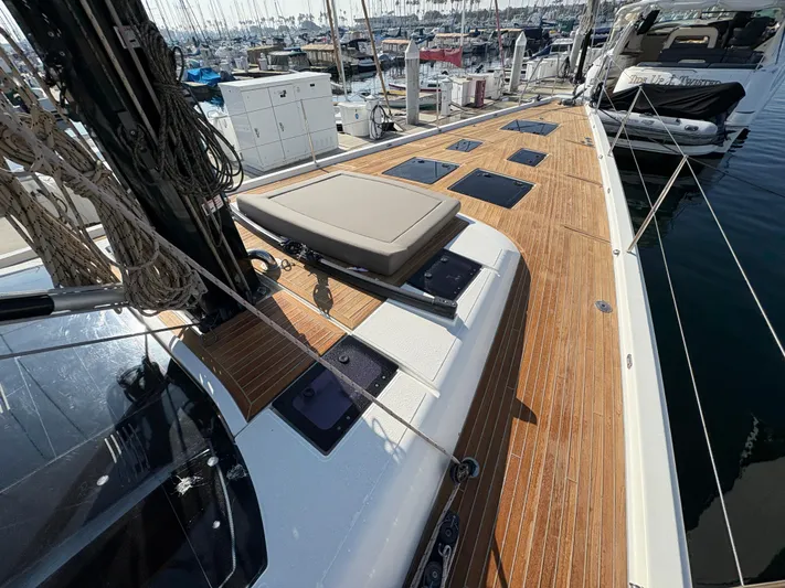 560 Exclusive Yacht Photos Pics Dufour 560 Exclusive 2018 yacht deck with teak finish and marina view.