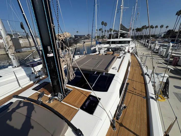 560 Exclusive Yacht Photos Pics 2018 Dufour 560 Exclusive yacht docked, featuring sleek design and spacious deck.