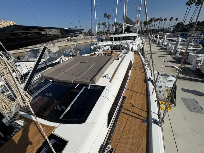 560 Exclusive Yacht Photos Pics Dufour 560 Exclusive 2018 yacht docked, showcasing sleek design and spacious deck.