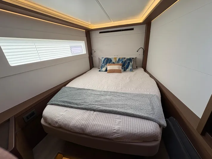 560 Exclusive Yacht Photos Pics Luxurious cabin interior of 2018 Dufour 560 Exclusive yacht with cozy bedding.