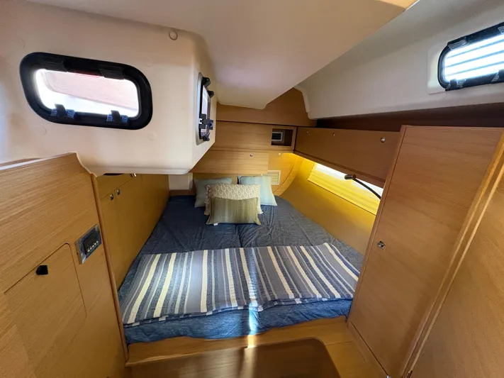 560 Exclusive Yacht Photos Pics Luxurious cabin interior of 2018 Dufour 560 Exclusive yacht with cozy bedding.