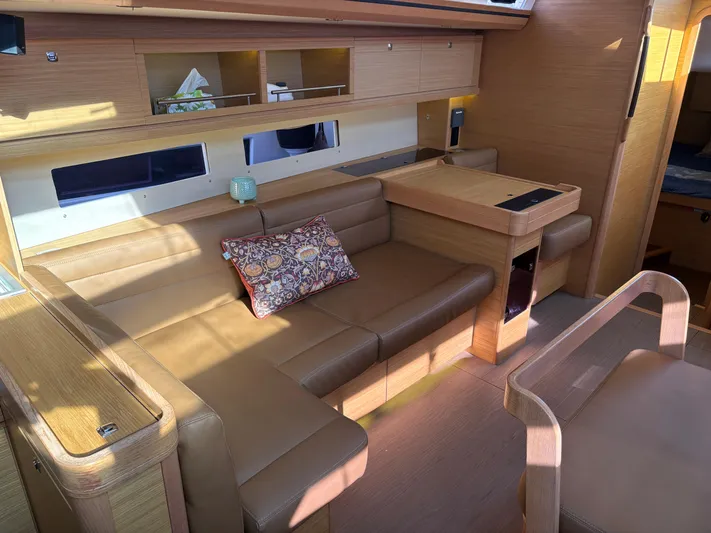 560 Exclusive Yacht Photos Pics Luxurious interior of 2018 Dufour 560 Exclusive yacht with elegant leather seating.