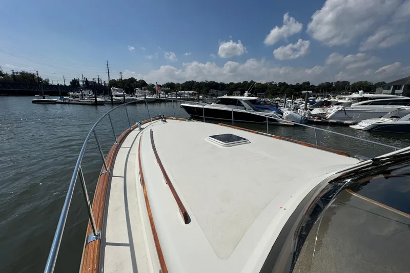  Yacht Photos Pics 2020 Vicem 50 Classic yacht docked in a marina under a clear blue sky.