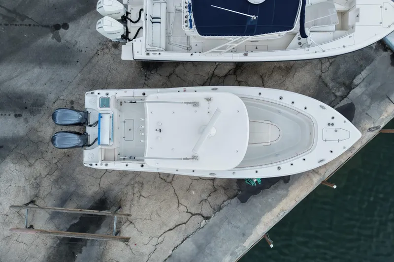  Yacht Photos Pics Overhead view of 2021 Sea Hunt Gamefish 30 Coffin Box boat docked.