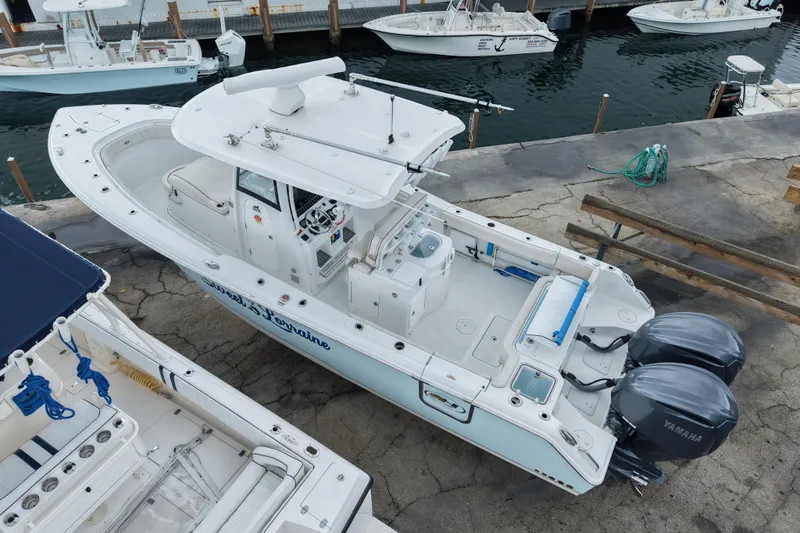  Yacht Photos Pics 2021 Sea Hunt Gamefish 30 Coffin Box boat docked with twin Yamaha engines.