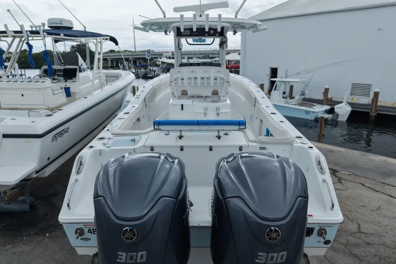  Yacht Photos Pics 2021 Sea Hunt Gamefish 30 Coffin Box boat with dual Yamaha 300 engines at dock.