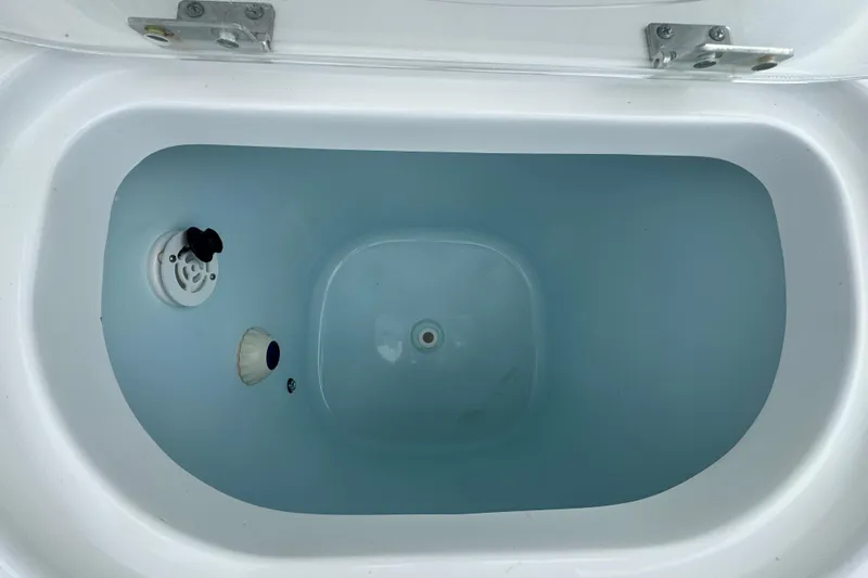  Yacht Photos Pics 2021 Sea Hunt Gamefish 30 Coffin Box interior with water, showcasing design and functionality.