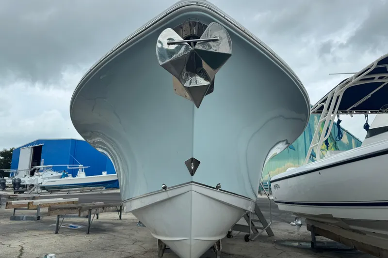  Yacht Photos Pics 2021 Sea Hunt Gamefish 30 Coffin Box boat, docked under cloudy skies.