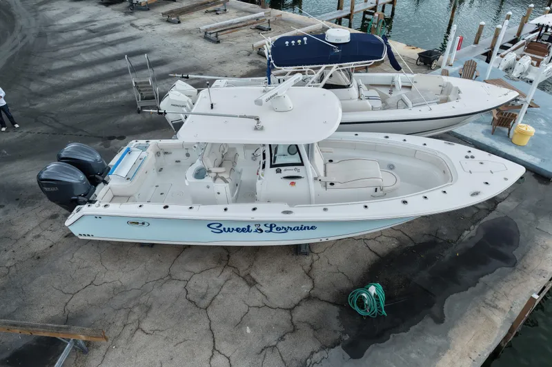  Yacht Photos Pics 2021 Sea Hunt Gamefish 30 Coffin Box boat docked, aerial view.
