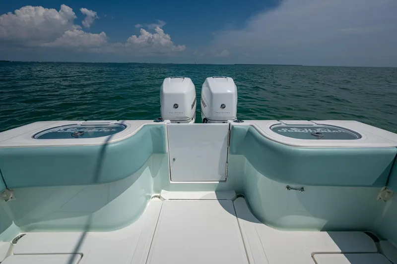  Yacht Photos Pics 2023 SeaHunter 31 Tournament boat with dual engines on open water.