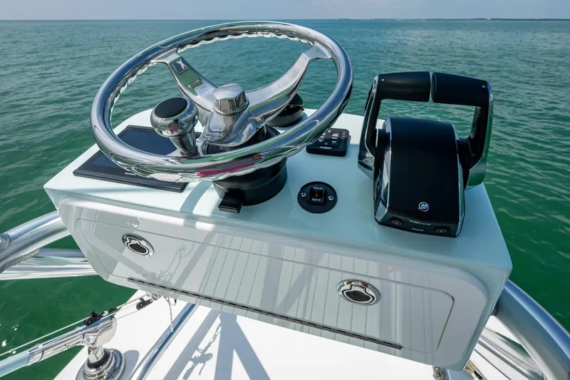  Yacht Photos Pics Control panel of 2023 SeaHunter 31 Tournament boat with ocean backdrop.