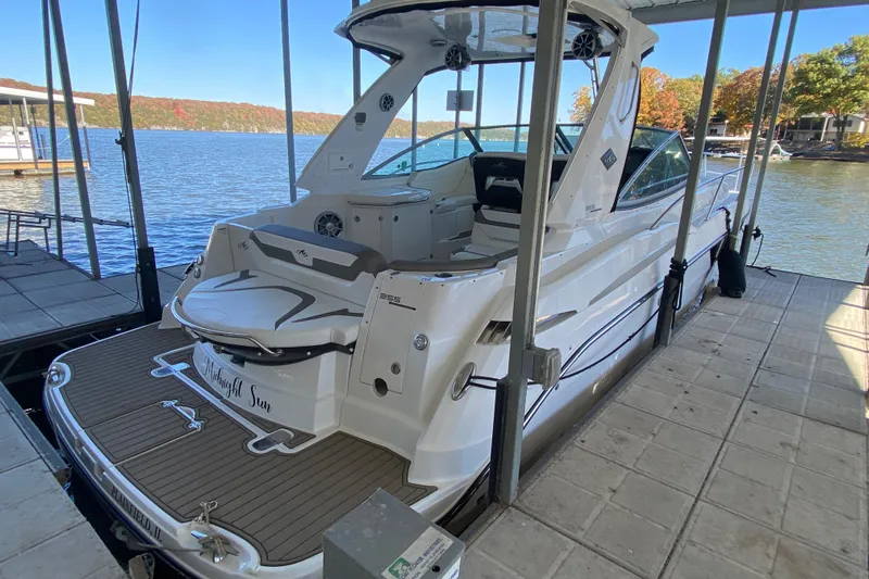  Yacht Photos Pics 2017 Monterey 355 Sport Yacht docked, showcasing sleek design and spacious deck.
