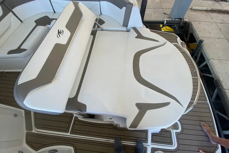  Yacht Photos Pics 2017 Monterey 355 Sport Yacht interior with white and brown seating on deck.