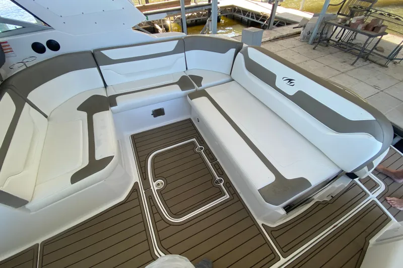  Yacht Photos Pics 2017 Monterey 355 Sport Yacht interior with white and brown seating and deck.
