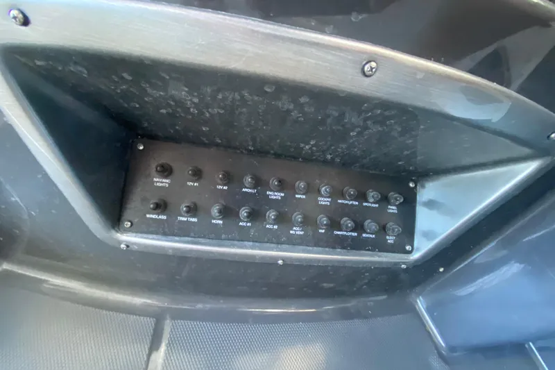  Yacht Photos Pics Control panel of a 2017 Monterey 355 Sport Yacht with various switches and labels.