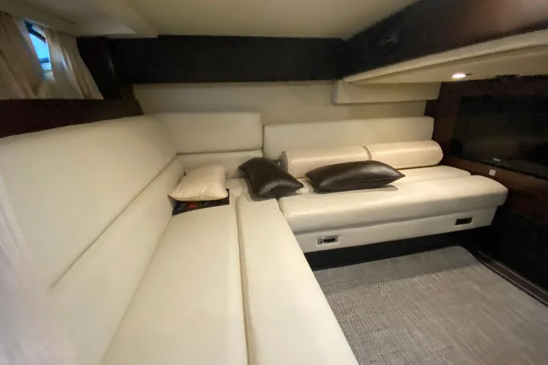  Yacht Photos Pics Luxurious interior of 2017 Monterey 355 Sport Yacht with plush seating and cushions.