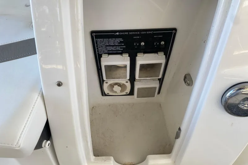  Yacht Photos Pics Power outlet panel on 2017 Monterey 355 Sport Yacht, featuring shore service connections.