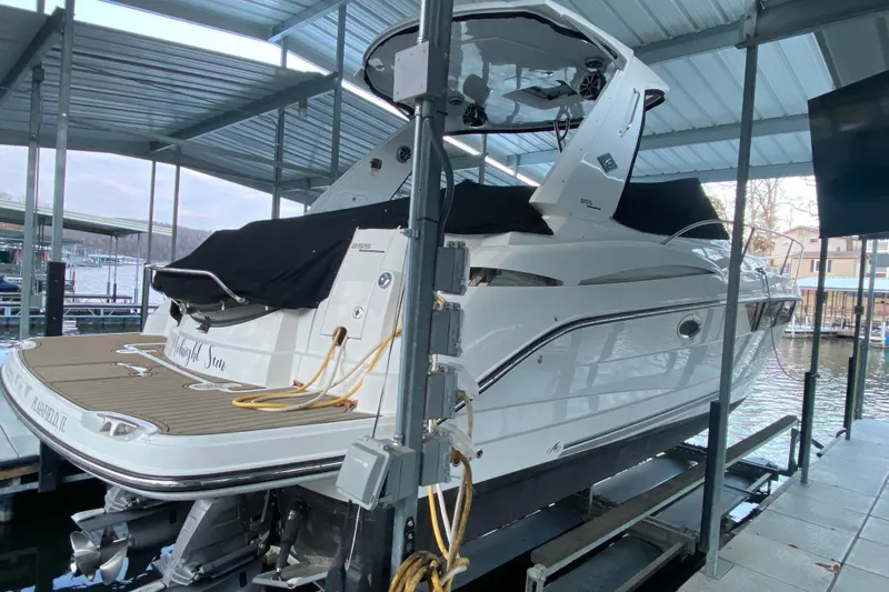  Yacht Photos Pics 2017 Monterey 355 Sport Yacht docked under a covered marina.