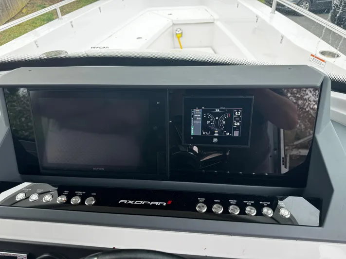  Yacht Photos Pics Axopar 28 CABIN 2019 dashboard with navigation and control panel.