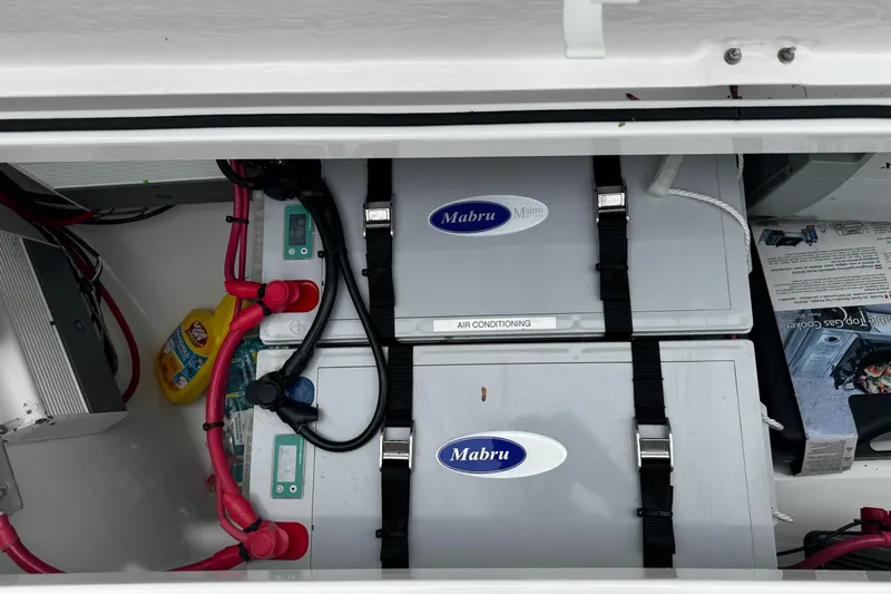  Yacht Photos Pics 2019 Axopar 28 CABIN battery compartment with Mabru air conditioning units.