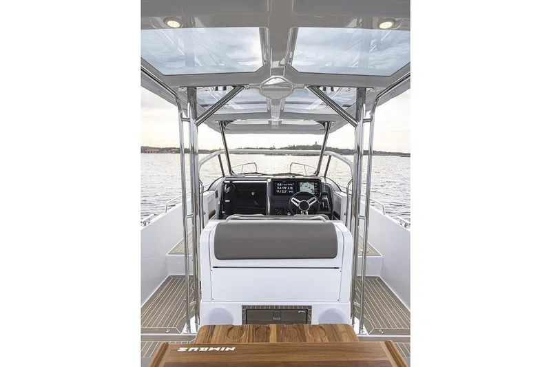  Yacht Photos Pics Interior view of 2025 Nimbus T9 boat cockpit with modern controls and seating.